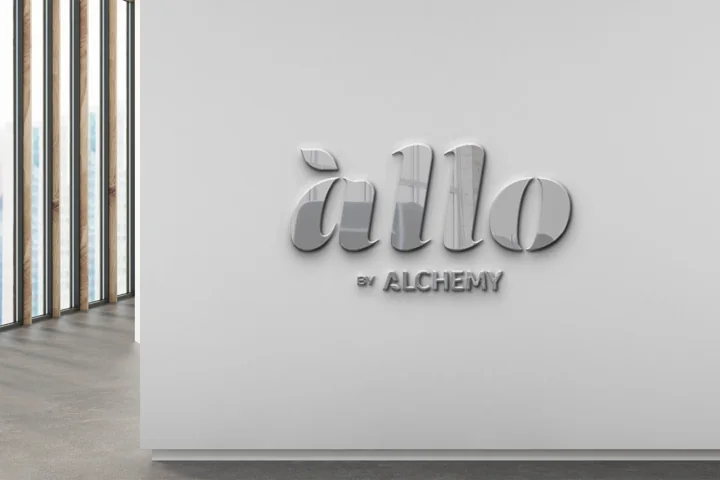 The Allo by Alchemy wordmark presented in dimensional silver lettering.