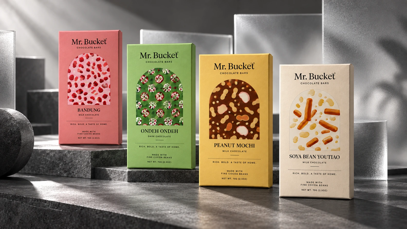 Four colourful Mr. Bucket chocolate-bar packs displayed against monochrome glass.