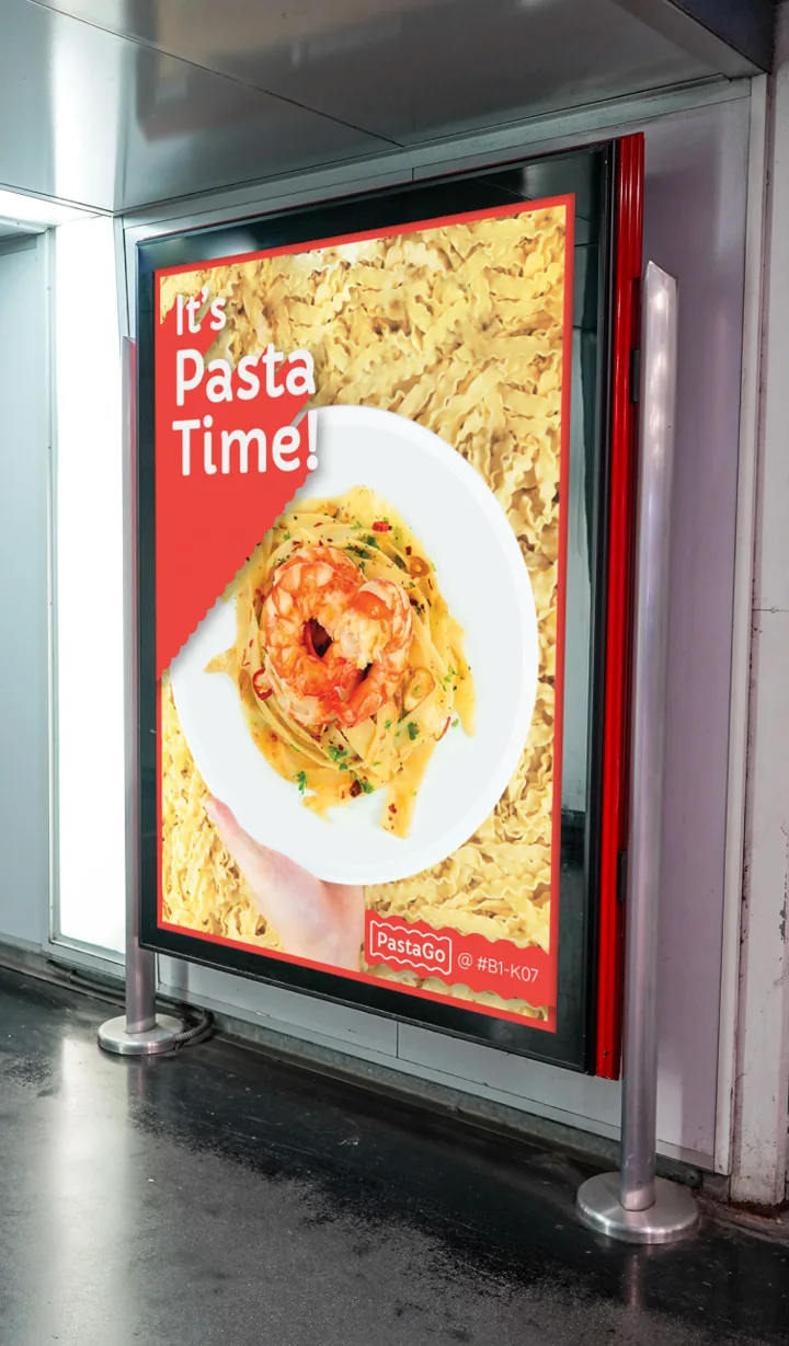 PastaGo food campaign poster in an outdoor display.